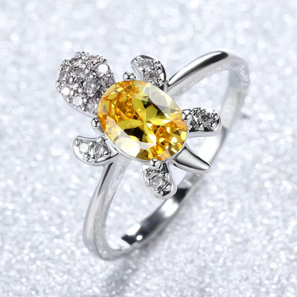 Platinum Ring With A Colored Tortoise Design Featuring Blue Diamondsunisex