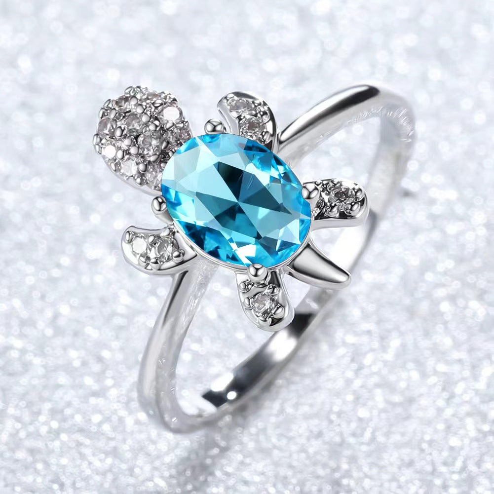 Platinum Ring With A Colored Tortoise Design Featuring Blue Diamondsunisex