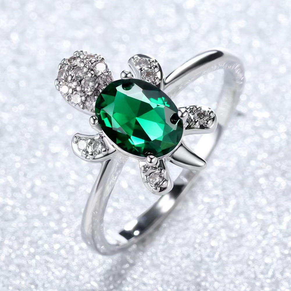 Platinum Ring With A Colored Tortoise Design Featuring Blue Diamondsunisex