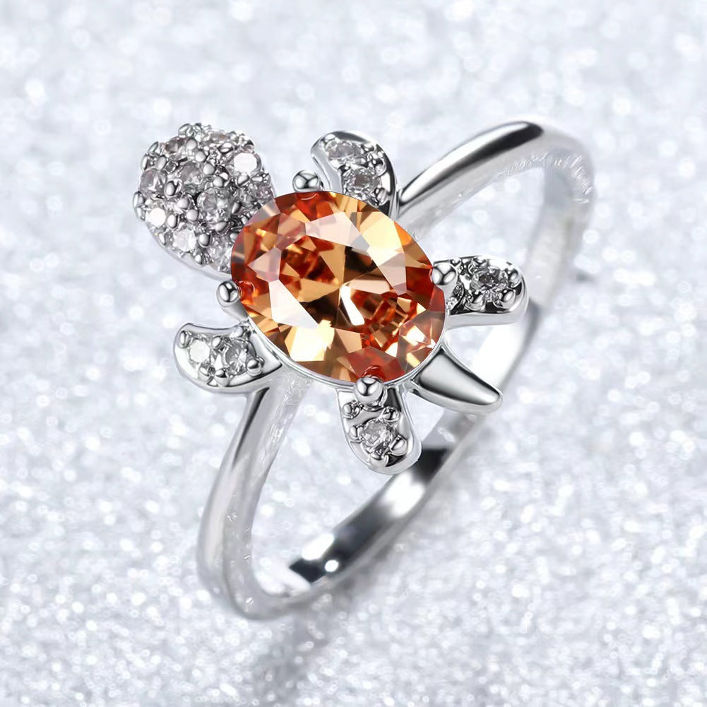 Platinum Ring With A Colored Tortoise Design Featuring Blue Diamondsunisex