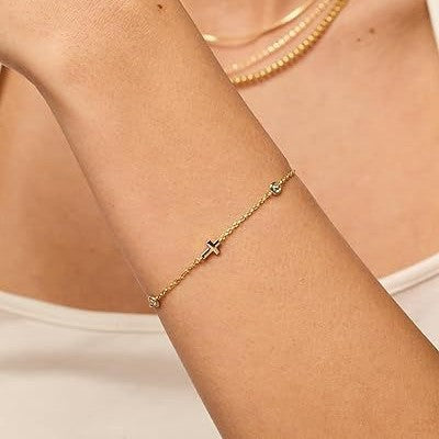 Compact Cross Charm Bracelet For A Touch Of Coastal Luxury