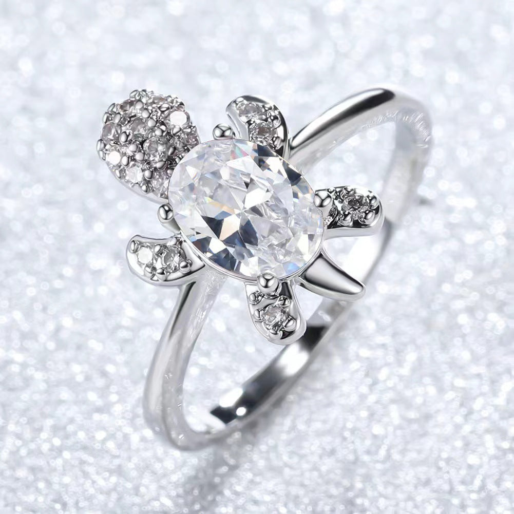 Platinum Ring With A Colored Tortoise Design Featuring Blue Diamondsunisex